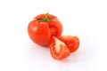 Cut tomato with two slices Royalty Free Stock Photo