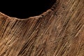 Cut tree trunk, colorful and patterned wood. Significant saw traces on wooden surface