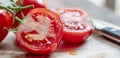 Cut Truss Tomatoes on Board with Knife