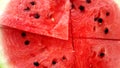 Cut watermelon with black seeds. Vegan food.