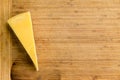 Cut wedge of fresh Dutch Maasdam cheese