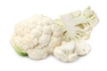 Cut and whole cauliflowers on white background