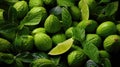Cut and whole fresh green figs and limes with leaves Royalty Free Stock Photo