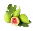 Cut and whole green figs with leaves isolated on white Royalty Free Stock Photo