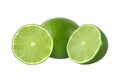 Cut and whole lime fruits isolated on white background Royalty Free Stock Photo