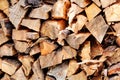 Cut wood, firewood for the winter. Cut logs fire wood and ready pieces of wood for heating wood. Royalty Free Stock Photo