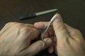 Cut your fingernails with small nail scissors,