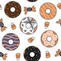 Cute lovely abstract seamless vector pattern background illustration with cartoon halloween donuts and candies Royalty Free Stock Photo