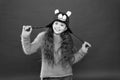 Cute accessories. Girl wear winter theme accessory. Fun and joy. Playful tiger. Festive spirit. Cheerful smiling kid