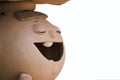 Cute action of laughing broken tooth child sculpture