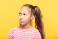 Cute adolescent girl looking up sideways portrait