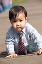 Cute Baby Crawling On The Pier Royalty Free Stock Photo