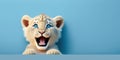 cute adorable lion cub smiling and isolated on blue background with copy space generative ai Royalty Free Stock Photo