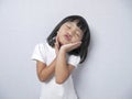 Cute Adorable Little Girl Doing Sleeping Gesture