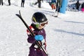 Cute adorable little kid boy enjoy having fun sledging down hill of snow heap snowdrift at alpine mountain skiing resort Royalty Free Stock Photo