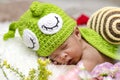 Cute and adorable newborn baby with snail costume sleeping