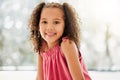 Cute, adorable and sweet young girl with a happy and healthy childhood growing up at home. Portrait of an innocent young Royalty Free Stock Photo