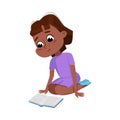 Cute African American Girl Sitting on Floor and Reading Book, Preschooler Kid or Elementary School Student Enjoying