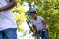 Cute african american kids riding bikes in the park Royalty Free Stock Photo