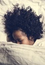 African child sleeping alone quietly