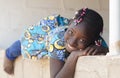 Cute African Ethnicity Girl Laying Outdoors Smiling and Laughing Royalty Free Stock Photo