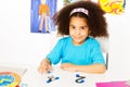 Cute African girl learn numbers with coins Royalty Free Stock Photo