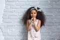 Happy afro girl with shopping bags Royalty Free Stock Photo