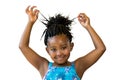 Cute african girl playing with braided hair. Royalty Free Stock Photo