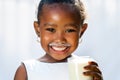 Cute african girl showing white milk mustache. Royalty Free Stock Photo