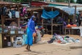 Cute African looked back, going on the market (Bomassa, Congo Republic)