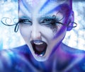 Cute and agry woman screaming. Creative make up on fashion model Royalty Free Stock Photo