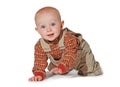 Cute alert baby crawling towards the camera Royalty Free Stock Photo