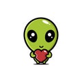 Cute alien cartoon character holding a love heart Royalty Free Stock Photo