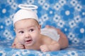 cute angel baby on blue background