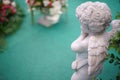 Cute Angel statue in the garden. Beautiful, thais, cupid Royalty Free Stock Photo