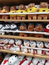 Cute animal dolls/toys on orderly store shelves