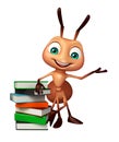 cute Ant cartoon character with book stack Royalty Free Stock Photo