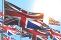 Cute any celebration flag 3d illustration - many United Kingdom UK flags are wave on blue sky background Royalty Free Stock Photo