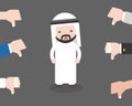Cute arab business man sad because people thumbs down on him, bu