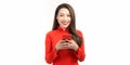 Cute asia girl in ao dai smiling and connect internet shopping online and present Royalty Free Stock Photo