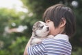 Cute asiaan child holding siberian husky Royalty Free Stock Photo