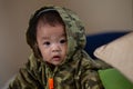 Cute Asian Baby boy with camouflage jacket Royalty Free Stock Photo