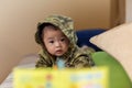 Cute Asian Baby boy with camouflage jacket Royalty Free Stock Photo