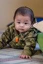 Cute Asian Baby boy with camouflage jacket Royalty Free Stock Photo