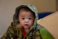 Cute Asian Baby boy with camouflage jacket Royalty Free Stock Photo