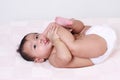 Cute Asian Baby Girl Sucking Her Toes Royalty Free Stock Photo