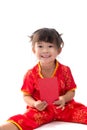 Cute Asian baby girl in traditional Chinese suit with red pocket Royalty Free Stock Photo