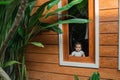 Cute asian baby peeking