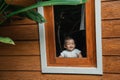 Cute asian baby peeking