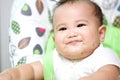 Baby Eating On Baby Chair Royalty Free Stock Photo